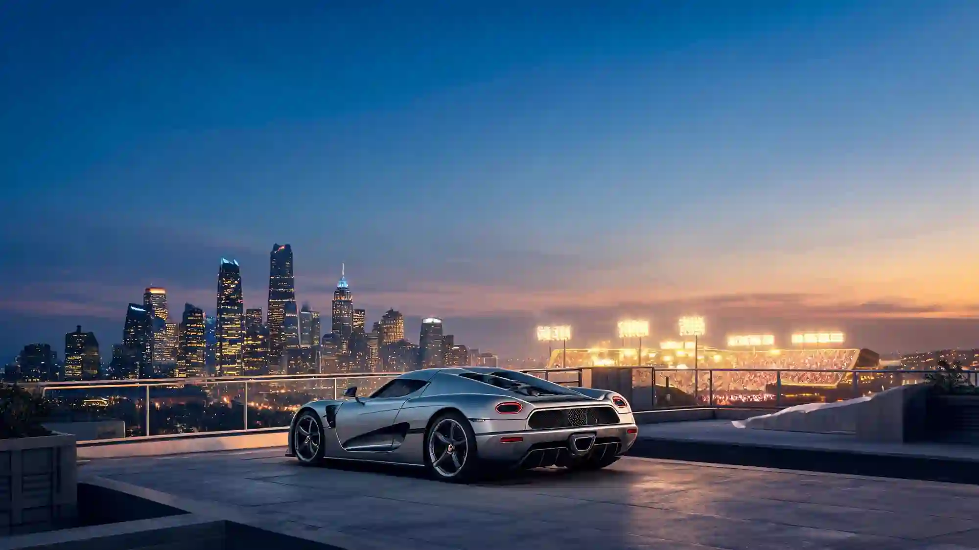 A luxury car on a rooftop overlooking the Los Angeles skyline at dusk